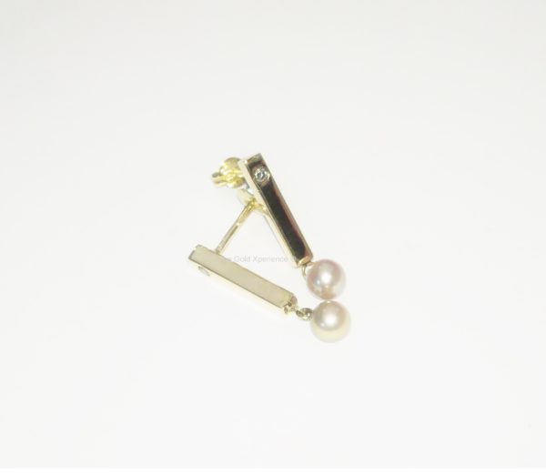 Oorsteker met parel en diamant