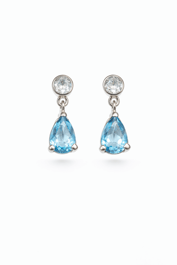 oorbel wit goud topaas blauw wit